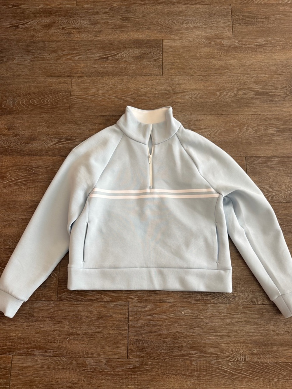 CALIA Women’s Light Blue Quarter-Zip Sweater with White Stripe.